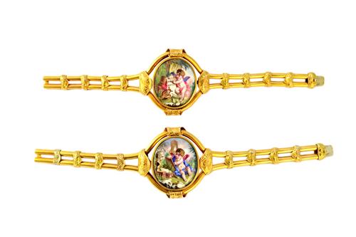 A pair of Victorian enamelled bracelets, each of the differing oval panels decorated with cherubs enjoying artistic and musical pursuits in landscape