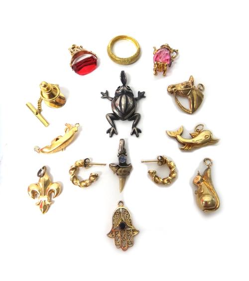 Five 9ct gold charms, including; a squirrel, a horses head and a dolphin, three foreign charms, a 9ct gold ring, having a textured finish, a pair of 9