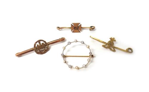 A gold, diamond and seed pearl set brooch, of circular form (one seed pearl lacking) and three mostly gold military bar brooches, (4).