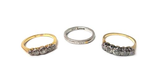 A gold and diamond set five stone ring, mounted with a row of cushion shaped diamonds, graduating in size to the centre stone, detailed 9 CT, another