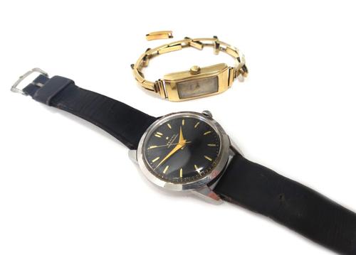 A gentleman's circular steel cased Zenith Automatic wristwatch, the signed circular black dial with gilt baton shaped numerals and with centre seconds