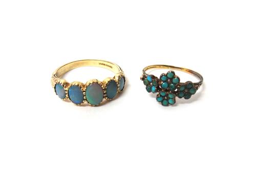 A 9ct gold ring, mounted with a row of five graduated oval opal doublets, ring size Q and a half and a turquoise and seed pearl ring, designed as four