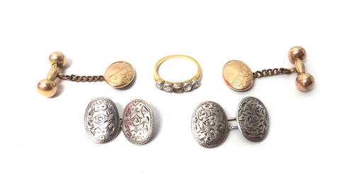 A gold ring, mounted with four cushion shaped diamonds (the centre diamond lacking), ring size K, a pair of 9ct gold cufflinks, each having an oval fr