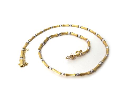 A two colour gold necklace, in a waisted bar with a textured finish and polished bead link alternating design, on a snap clasp fitted with a safety ch