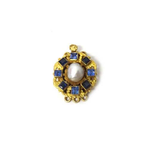 A sapphire and cultured pearl set three row oval clasp, centred by a single cultured pearl, within a variously cut border of square cut sapphires.