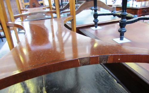 A gold bracelet in a wide quatrefoil shaped link design on a snap clasp, detailed 750, length 19.3cms, gross weight 53gms.