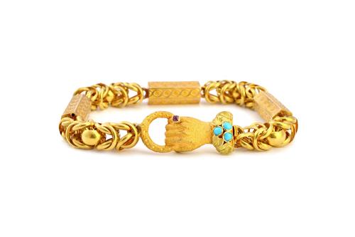 An early Victorian gold and turquoise set bracelet, in a multiple chain link and decorated hexagonal baton shaped link design, the two colour gold tur