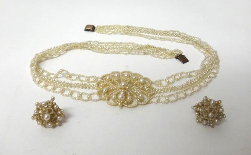 A seed pearl and mother of pearl necklace, the front with a seed pearl openwork oval panel, otherwise in a three row design, a bracelet, in a similar