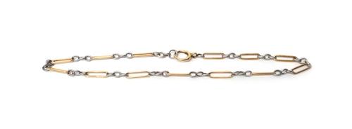 A two colour gold bar and oval link chain, fitted with a large boltring clasp, weight 28.5 gms.