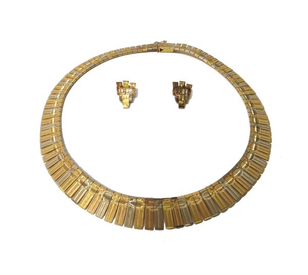 A three colour gold collar necklace, in a graduated bar link design, with engraved decoration and having a textured finish, on a snap clasp, detailed