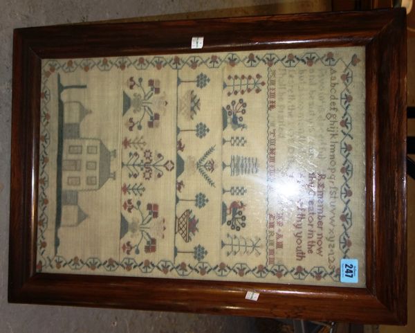 A 19th century needlework sampler in a rosewood frame.