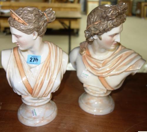 A pair of Continental porcelain busts of a male and female, (2).