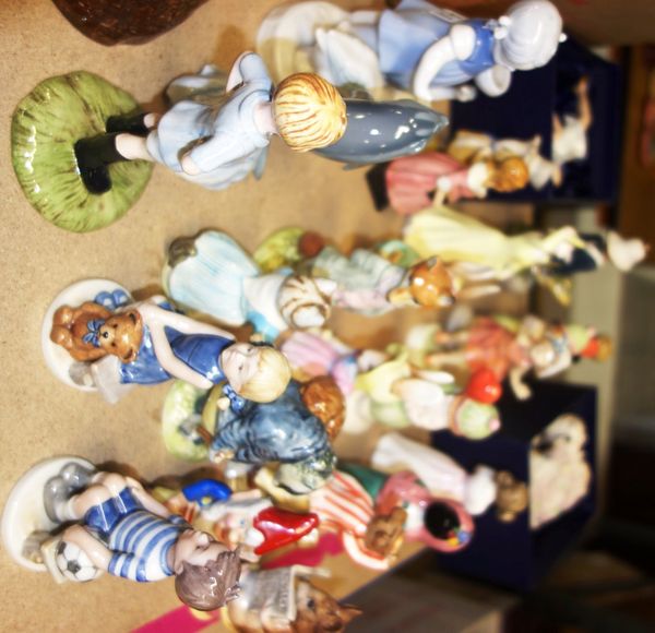 A group of ceramic figures including Beswick Beatrix Potter figures, Doulton Coalport and other figures, (qty).