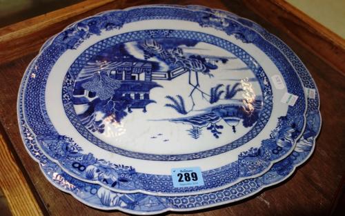 A Chinese 18th century blue and white oval plate and another similar, (2)