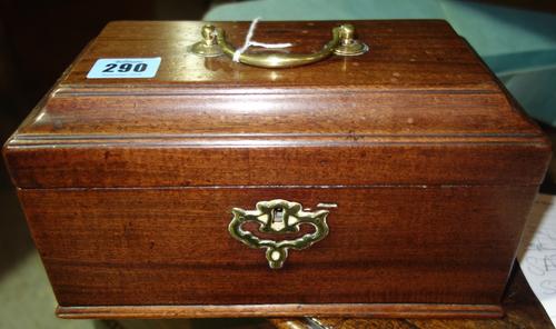 A 19th century mahogany tea caddy and a 19th century steel door lock, (2).