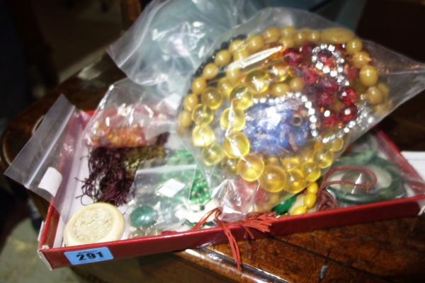 A quantity of assorted faux amber and bead necklaces, (qty).
