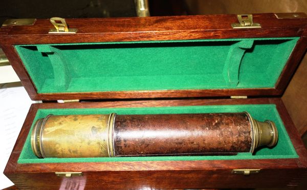 A Victorian brass and leather three draw telescope 'Barber London', in later mahogany box.