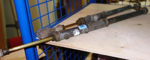 A similar pair of early 20th century garden sprayers (2).