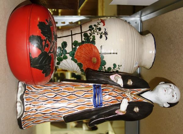 A pair of Japanese Satsuma baluster vases sparsely decorated, circa 1900, on turned mahogany bases 33cm high; a Japanese porcelain figure (damaged); a