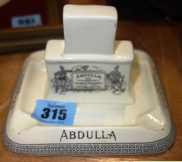 A 1920's porcelain ashtray/matchbox holder advertising "Abdullah Superb cigarettes-Pure No 75 Virginia"
