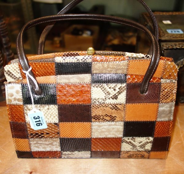 A 1970s faux snakeskin and leather handbag by Hilmer Manchester.