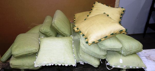A green upholstered window seat cushion, 170cm wide x 50cm deep, together with seven matching scatter cushions, four green tweed scatter cushions and