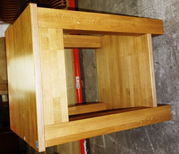 A modern oak square two tier kitchen island, on block supports, 70cm wide.
