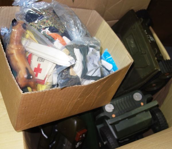 A quantity of action man toys, vehicles and accessories.
