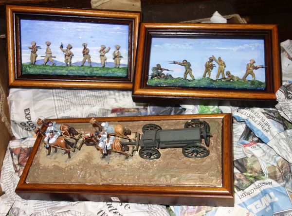 A quantity of 20th century dioramas depicting military battle scenes.