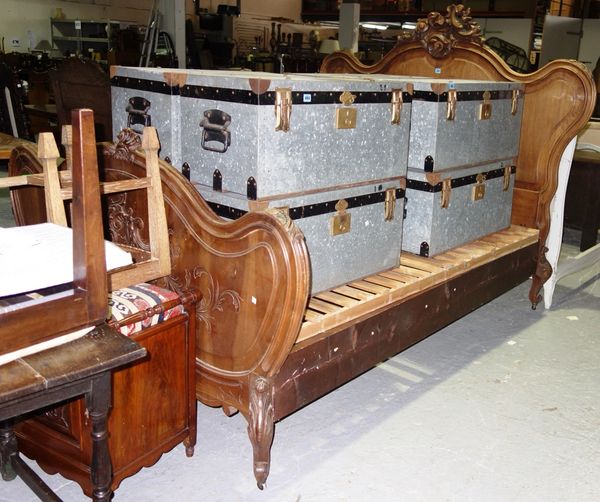 A 20th century French walnut double bed.