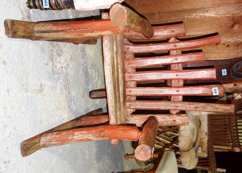 A 20th century naturalistic red painted child's chair.
