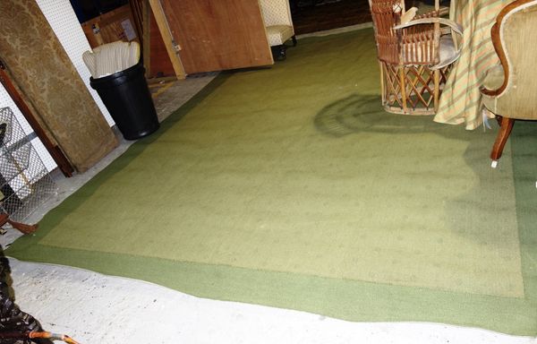 A large double shade green ground carpet, 430cm x 320cm.