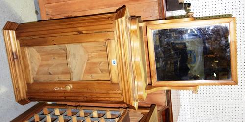 A 20th century small pine corner cabinet and a pine swing frame mirror, (2).
