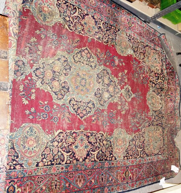 A Kerman rug, 296cm x 194cm.