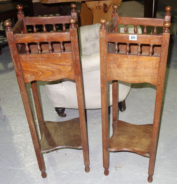 A pair of 20th century oak jardiniere stands, (2).
