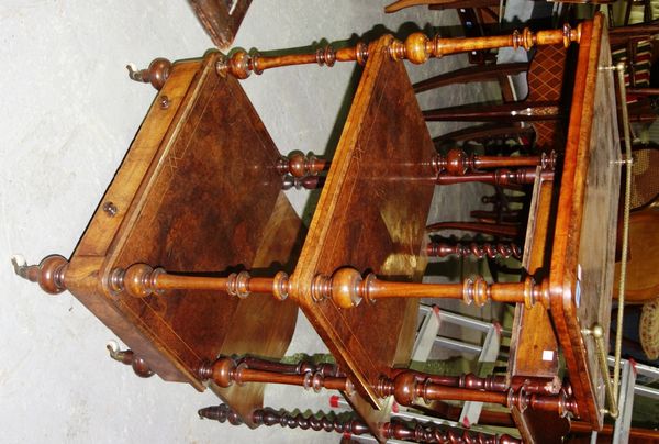 A Victorian walnut and inlaid three tier what-not.
