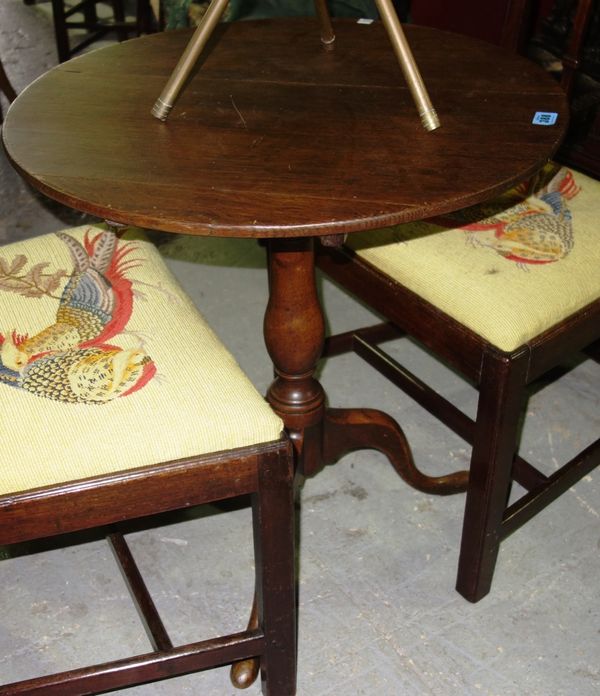 A 19th century mahogany circular tripod table and another.