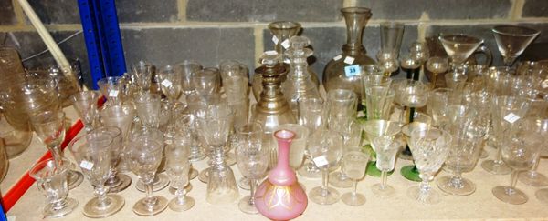 A large quantity of 18th century and later glass, including etched and cut drinking glasses, decanters, bowls and sundry, (qty).