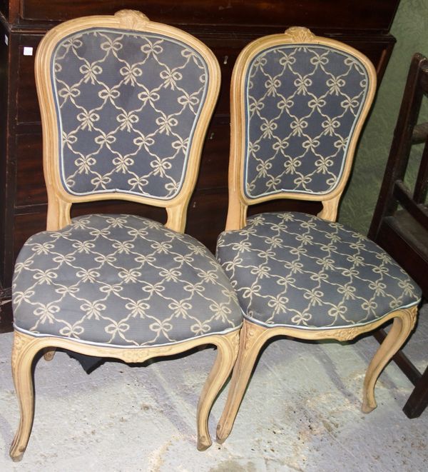 A pair of 20th century beech blue upholstered fauteuils.