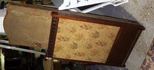 A 19th century upholstered three fold screen and a walnut framed two fold screen.