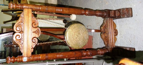 A 20th century oak framed gong on stand.
