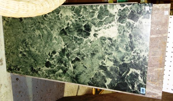 A group of four rectangular marble tops.