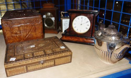 A group of collectables including three mantel clocks, a carved wooden box, an inlaid box, and a Mappin & Webb silvered teapot, (qty).
