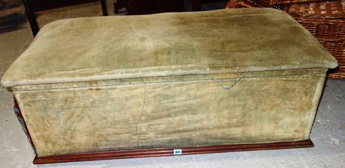 A 19th century mahogany and green velvet box ottoman.