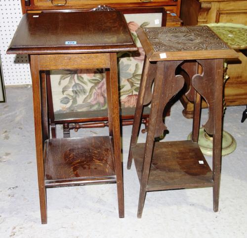 A 20th century oak two tier square occasional table and a similar carved walnut table. (2)