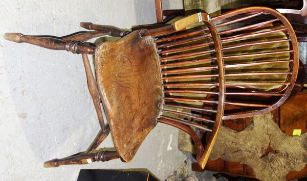 A 19th century ash and elm stick back Windsor armchair.