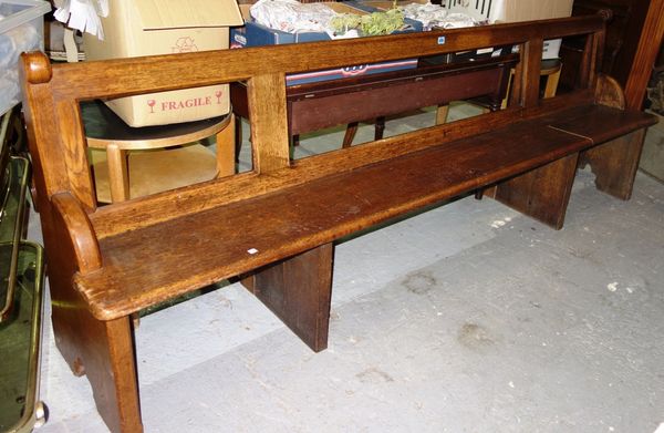 A large Victorian pitch pine pew.