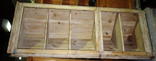 An early 20th century painted pine floor standing corner display cupboard.