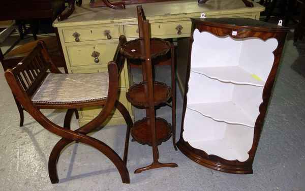 A small walnut bowfront corner cabinet, a folding stool and a cake stand. (3)