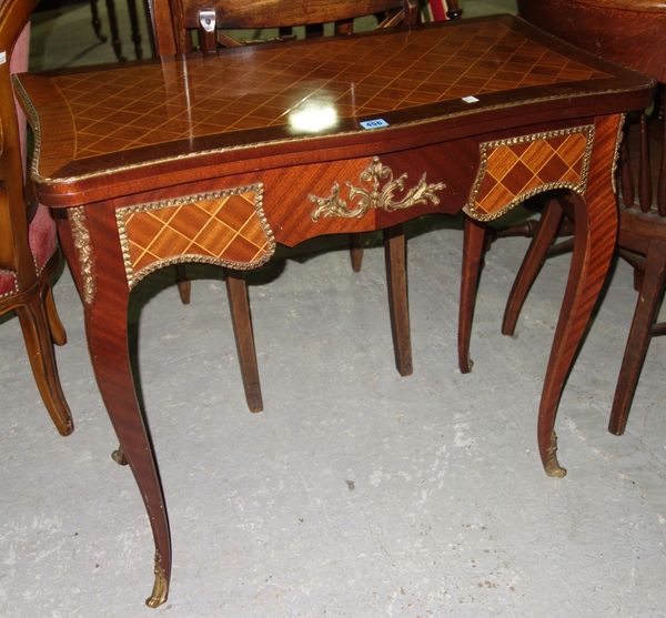 A 20th century French mahogany and gilt metal mounted card table.